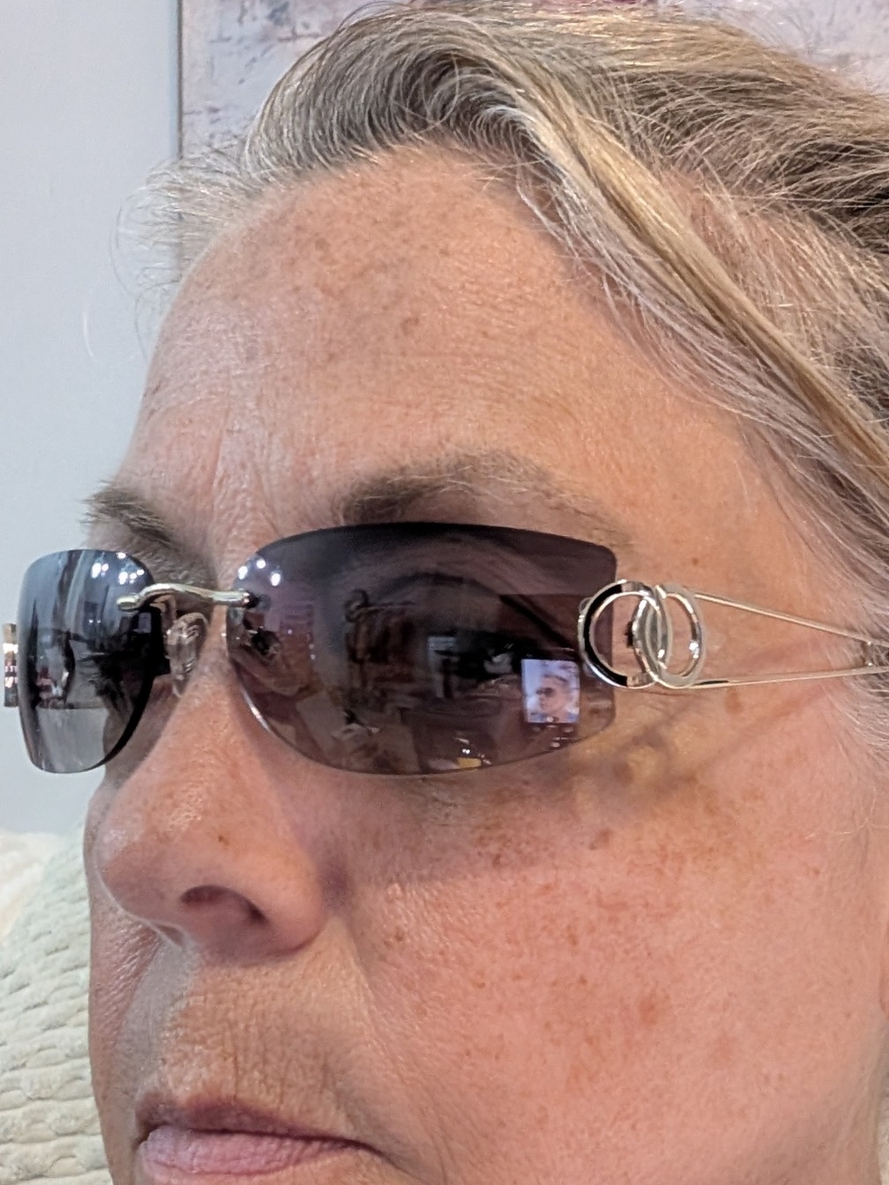 Rimless Women's Sunglasses with Silver Temples and Gray Lenses